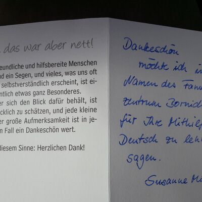 Bedruckte Karte mit handschriftlichem Dankestext