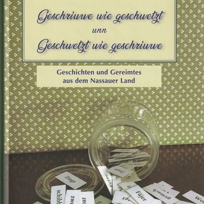 Buchcover mit dem Titel "Geschichten und Gereimtes aus dem Nassauer Land" auch in Dialektsprache.